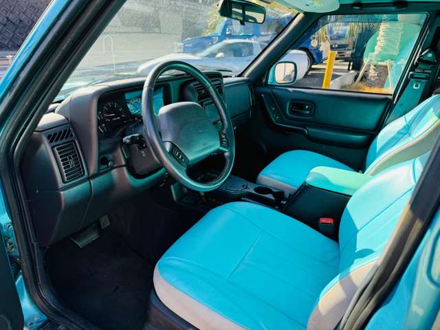 ジープ チェロキー リミテッド 4WD アクアブルー全塗装済 シート張替 大阪府の詳細画像 その17